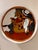 Unique wall plate crafted by a local artisan that adds color and interest to any room. Definitely a conversation starter....