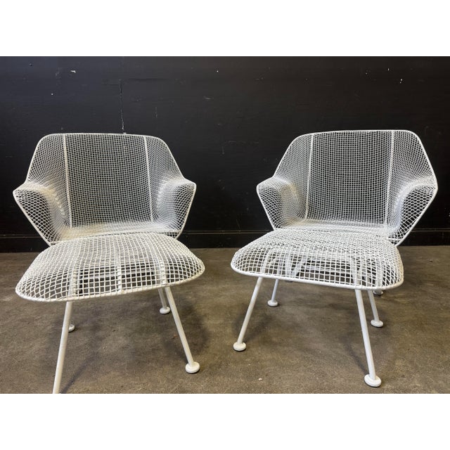 Pair of 1950’s Russell Woodard Sculptural Spring Chairs With Ottoman Set. No marked. Dimensions:chairs:33.5”w x 32.5”h x...