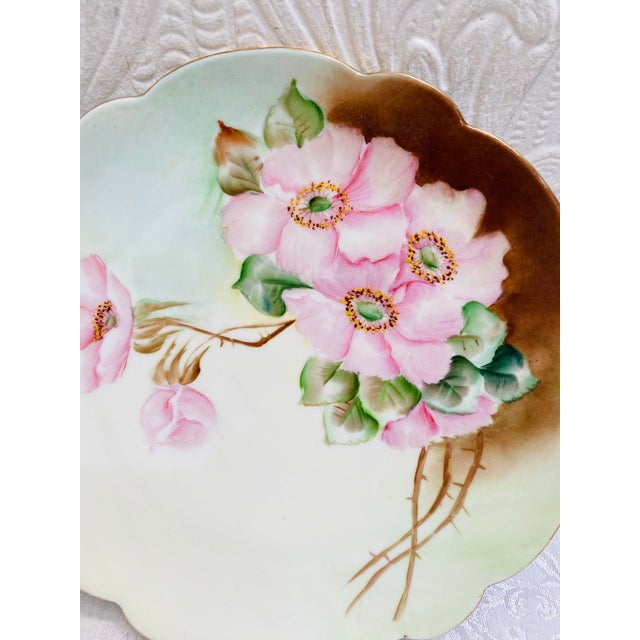 A beautiful, rare, hand-painted, art, nouveau, wild pink roses, decorative plate, awaits your decor. It would brighten any...