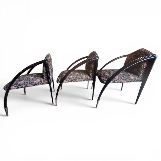 Vintage set of black lacquered armchairs in the style of Paul Frankl Modernage "D" chairs, featuring curved wooden...