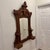 Stunning and rare 19th-century hand-carved wall mirror in the Eastlake or Victorian Gothic style, likely made of solid...