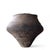 A striking vintage amphora-style vessel crafted in the Pre-Columbian tradition. This unmarked piece carries the quiet...