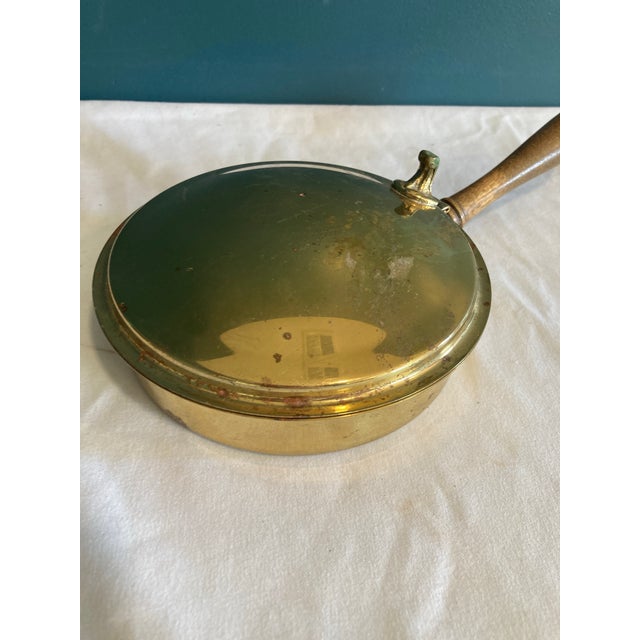 An exquisite example of vintage finds from a more elegant era of dining. This brass silent butler showcases the refined...