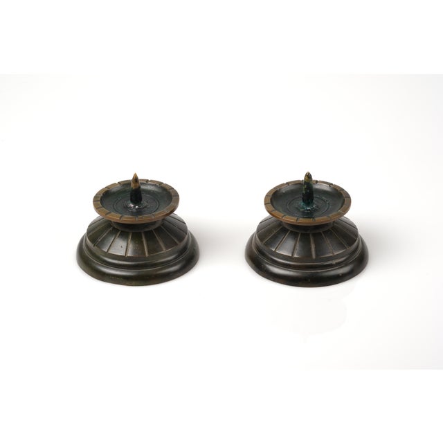 Pair of robust Danish Art Deco bronze candleholders, c 1930s.