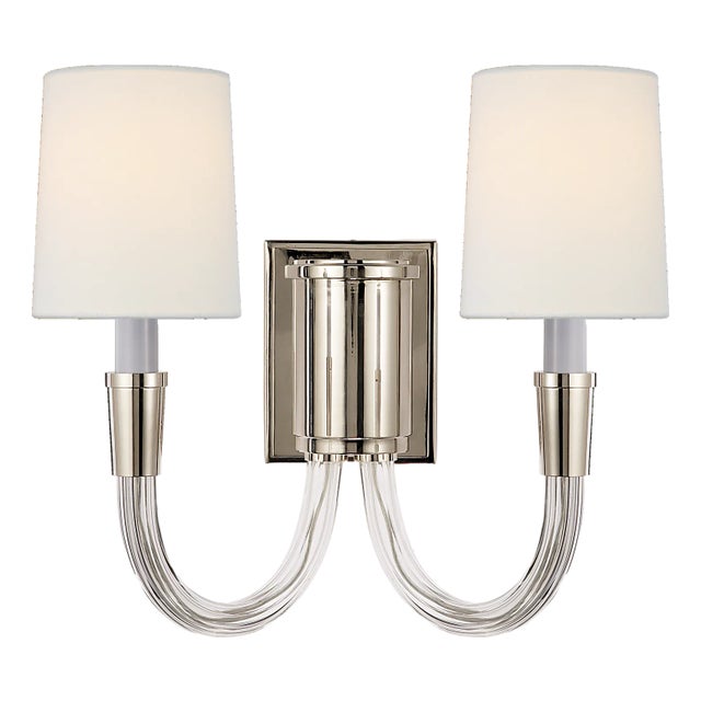 Description: Thomas O'Brien's Vivian creates a chic statement by highlighting the harmonious mix of curved crystal and...