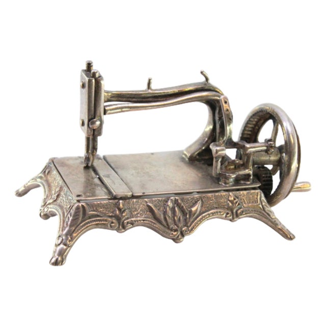 Miniature Sewing Machine in Silver with Reliefs and Applications For Sale