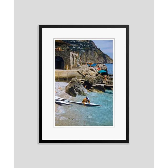 Canoeing In Capri 1959 by Toni Frissell Canoeists set out from a beach in Capri, Italy, 1959 Antoinette Frissell Bacon...