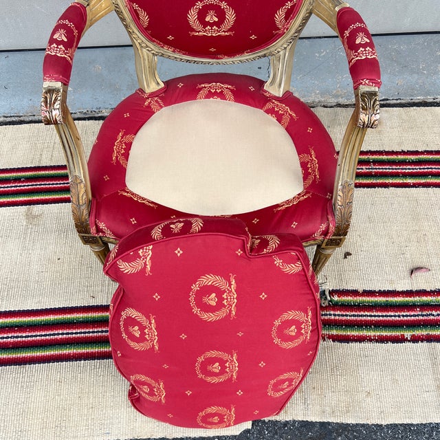 A Vintage Red Upholstered Painted Decorated and Carved French Bergere Arm Chair For Sale - Image 12 of 12