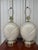 Make a sophisticated statement with this striking pair of sculptural ceramic table lamps, beautifully designed in the...