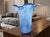 The vase, handmade by Venetian glass masters, features a design characterized by an organic and sinuous shape, with a top...