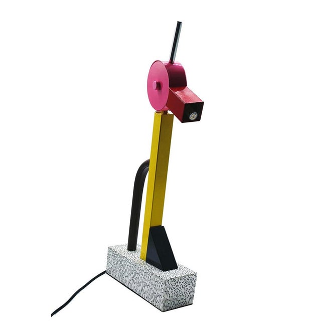 The Tahiti Lamp is one of the most representative objects of the postmodern movement. It is a sculptural and playful table...