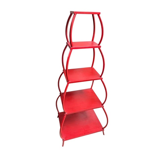 Vintage Chinese red pagoda-style metal etagere with detachable shelves.This piece features a distinct romantic silhouette...