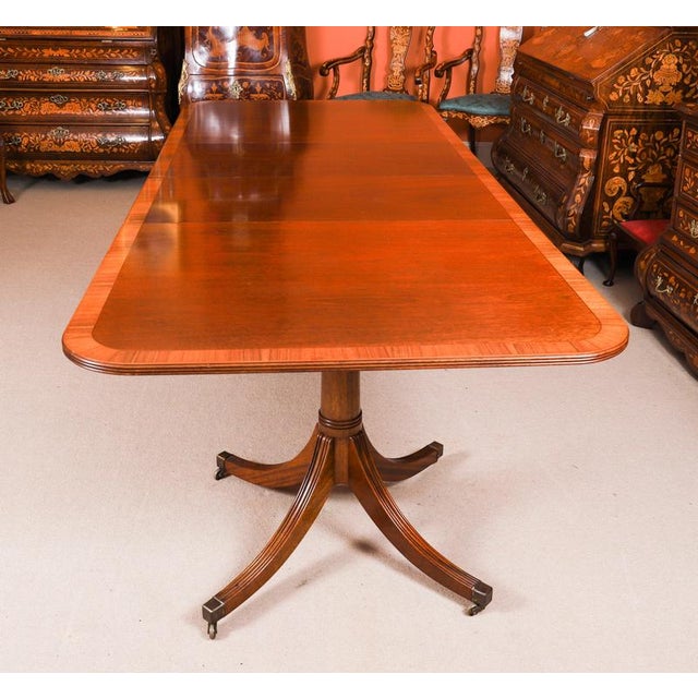 This is a fabulous vintage regency revival dining table by the master cabinetmaker william tillman, circa 1980 in date....