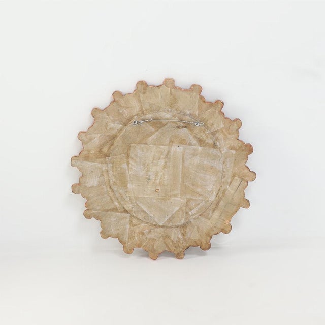 A large lime glass and resin convex mirror in the manner of Line Vautrin's "Trèfle" mirrors. The round frame with...