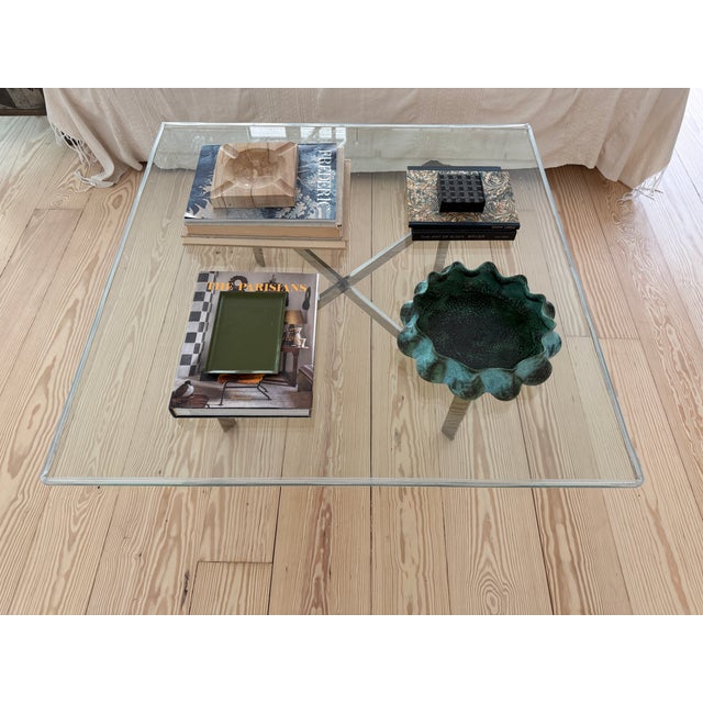 Vintage Cocktail Table of Glass and Polished Chrome Base from the Bauhaus period. A fantastic size that allows your living...