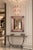 Elegant Italian Murano glass mirror, measuring 87 × 70 cm, featuring a richly articulated frame composed of multiple...
