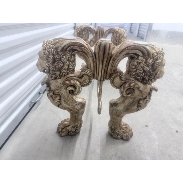 This dramatic sculptural, coffee table blends old world Italian grand door with contemporary abstract, artistry the base...