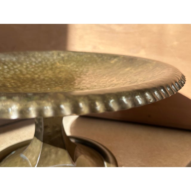 An elegant centerpiece in wrought and hammered brass, handcrafted in Germany during the 1920s. This sculptural piece has...