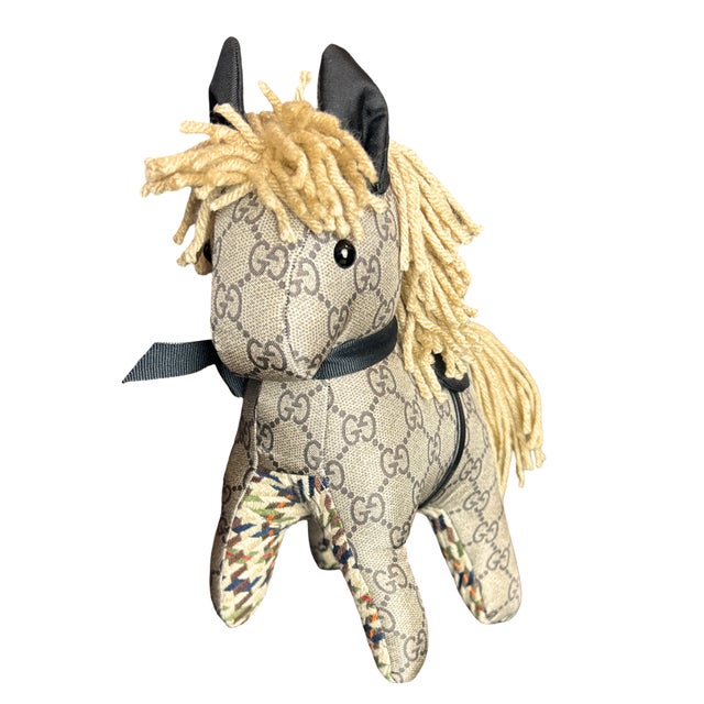 Vintage finds exclusively ours.&nbsp; Our vintage Gucci scarf animal menagerie is sustainably sourced, locally made with a...