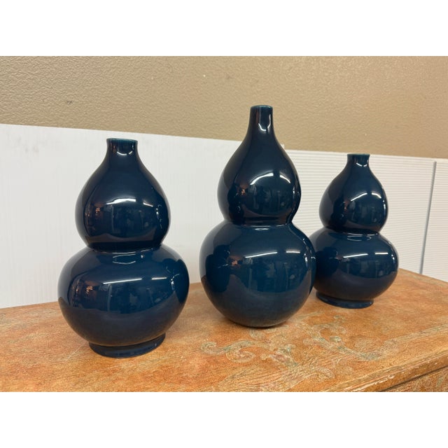 Design Plus Gallery presents a set of Three Double Gourd Ceramic Vases from Martino Interiors. Consisting of a matching...