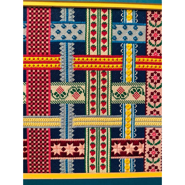 This lovely needlepoint was carefully crafted with love by its artist. Wonderful colors create a cheerful presentation...