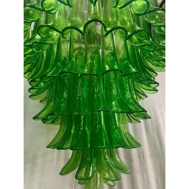 Extraordinary green color for this "Mazzega" Murano chandelier, a strong green color with a unique transparency. Its green...