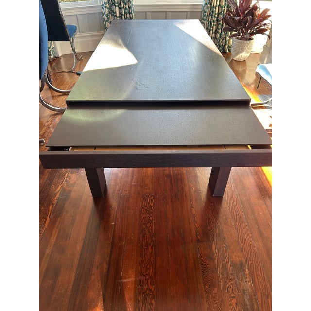 This beautiful Molteni Globo dining room table is a true eye-catcher. Made of high-quality wenge wood, this table exudes...