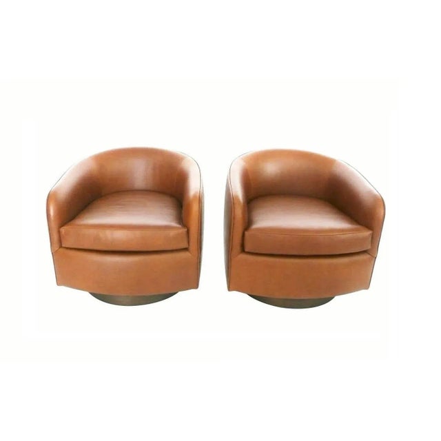 We love these chairs because of their style, comfort and the swivel. These Milo Baughman for Thayer Coggin tub chairs are...
