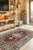 Sophie Chic Red Hand Knotted Wool Rug, Country of Origin: India. This striking piece presents a compelling fusion of...
