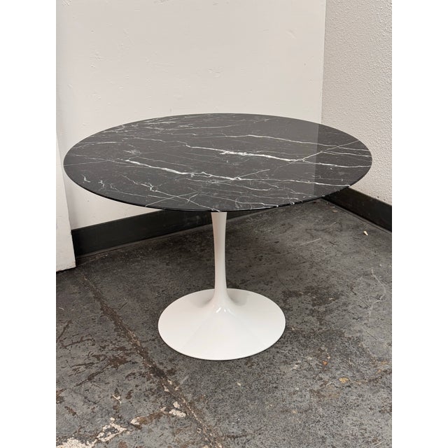 Design Plus Gallery presents a Vintage Saarinen Round Dining Table by Eero Saarinen for Knoll. This iconic pedestal table...