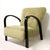 Particular decò armchair with black lacquered walnut structure. new padding and covering with green/dove gray velvet and...
