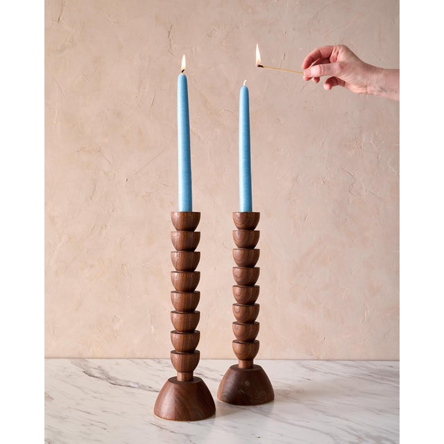 These gorgeous Walnut Candle Holders are each hand turned in a small wood shop in Pennsylvania. Reminiscent of Mid-Century...