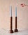 These gorgeous Walnut Candle Holders are each hand turned in a small wood shop in Pennsylvania. Reminiscent of Mid-Century...