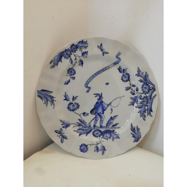 Decorative plate by Gio Ponti for Richard Ginori from the I Mestieri series. In shades of white and blue. The Fisherman...