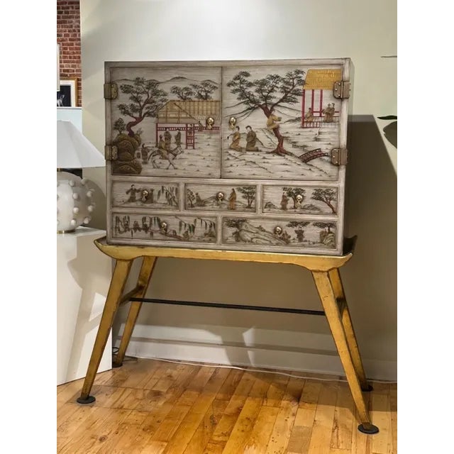 The Alfonso Marina Sheung Wan Bar Cabinet is a Chinoiserie cabinet with drawers and doors. The interior is adapted for a...