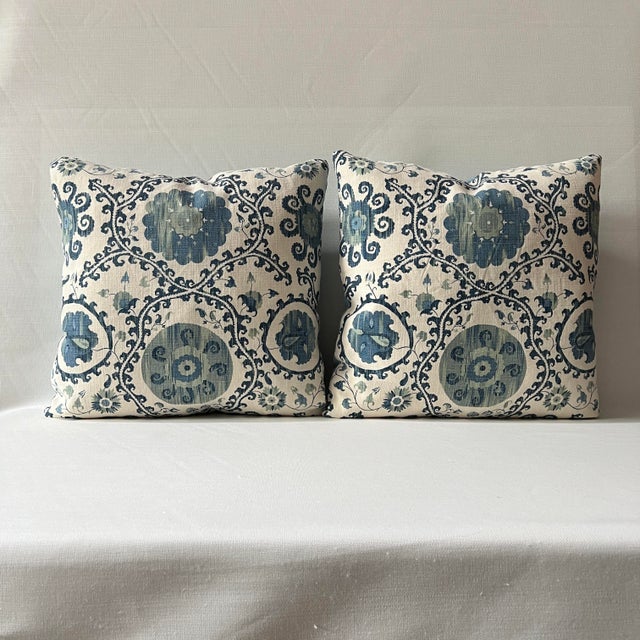 Custom-tailored contemporary floral motif on front and backs in solid blue backs. Hidden zipper. Interior serged seams....