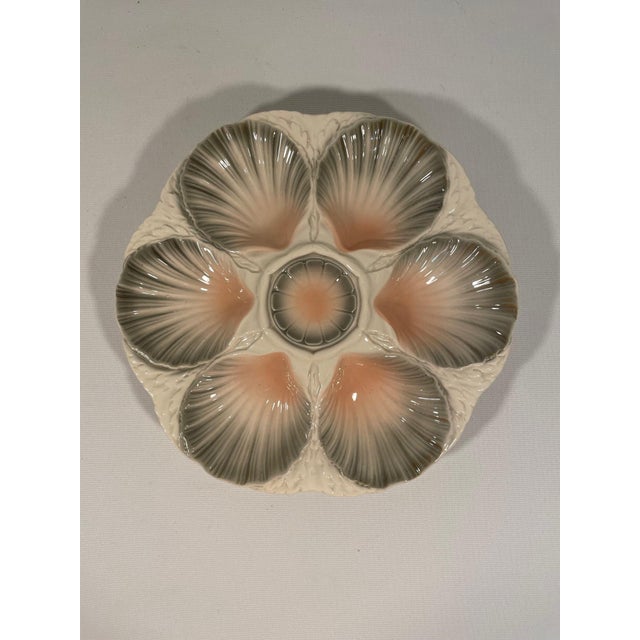 A stunning hand crafted ceramic Majolica Sarreguemines Oyster Plate made in northern France. Circa 1920s. Maker's marks...