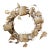 Late 20th Century Sculptural Metal Garden Wreath With Watering Cans & Weathered Patina For Sale
