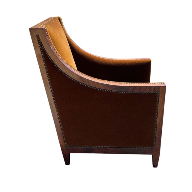 Marvelous French style club chair hand crafted by Dessin Fournir, Los Angeles. The Eyton Bergere has a mahogany frame with...