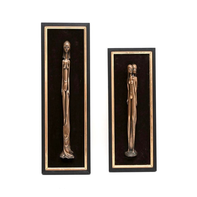 A beautiful pair of vintage framed bronze sculptures by Giovanni Schoeman, made in South Africa and dating from around the...