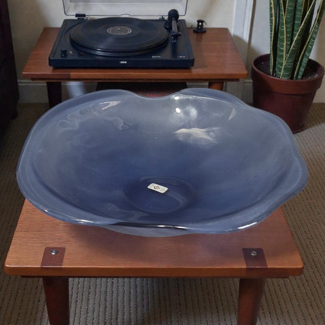 The Italian Art Glass Cadet Blue Frosted "CIVE" Platter is a stunning piece of decorative cookware that adds a touch of...