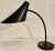 Rare Midcentury Modern desk lamp designed and manufactured by BAG TURGI, Switzerland. Circa 1950. Base and cone shade are...