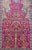 Woven in the 1930s in the historic city of Qum, this early 20th-century Persian prayer rug is a stunning example of the...