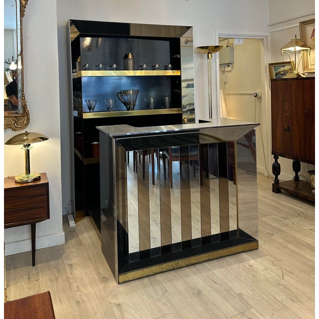 A large and extremely impressive vintage Italian chrome and brass bar cabinet. This was recently imported from Italy, it...