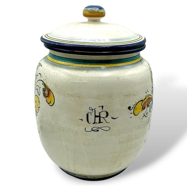 One vintage hand-painted Italian terracotta ceramic glazed jar with the original lid featuring a vibrant lemon and leaf...