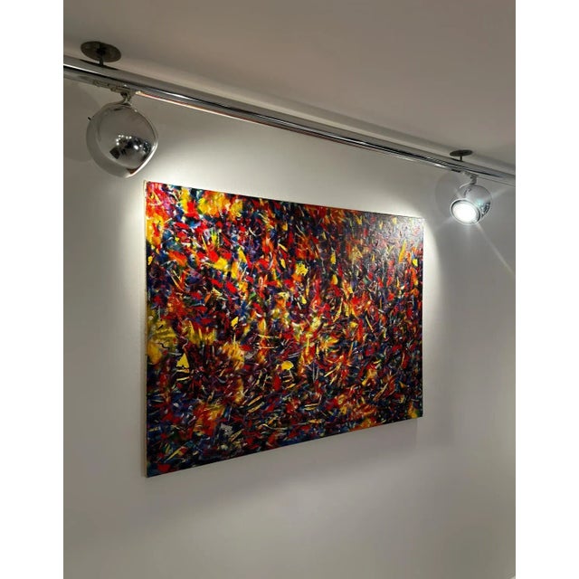 This large abstract expressionist painting by Jon Atac, created in 1989, is a bold and dynamic composition of blue, green,...