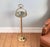 A beautifully decorated, light-colored, solid, vintage brass plant stand that complements almost any setting. The ashtray...