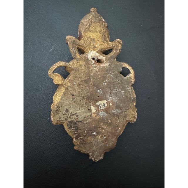 A rare and historically significant hand-carved wood coat of arms of Pope Pius VII, dating to shortly after 1800. This...