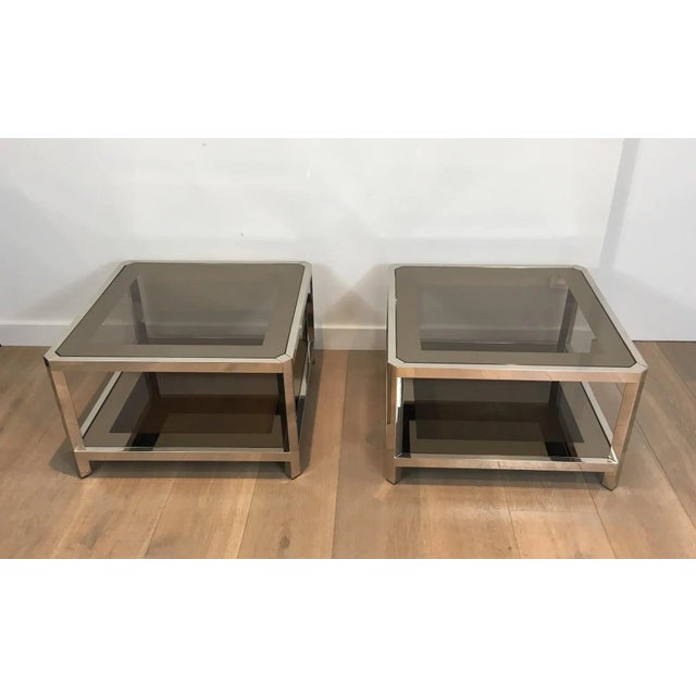 This very nice and unusual pair of large octagonal side tables is made of chrome with bronze glass shelves mirrored all...