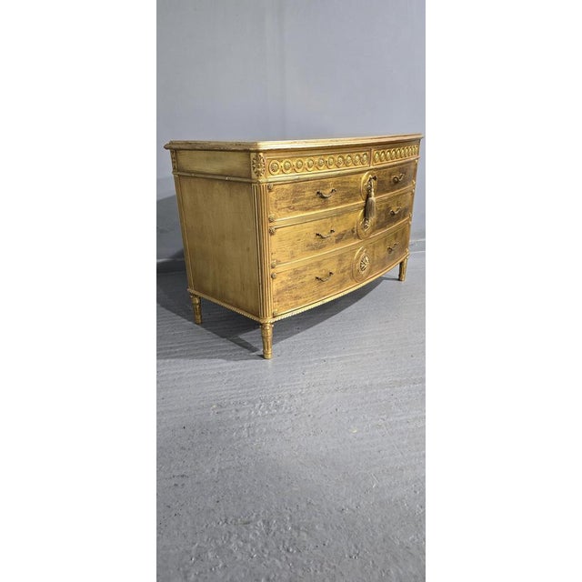 This is a lovely French bow fronted five drawer gilded chest of drawers, mahogany linings, working keys, in overall great...